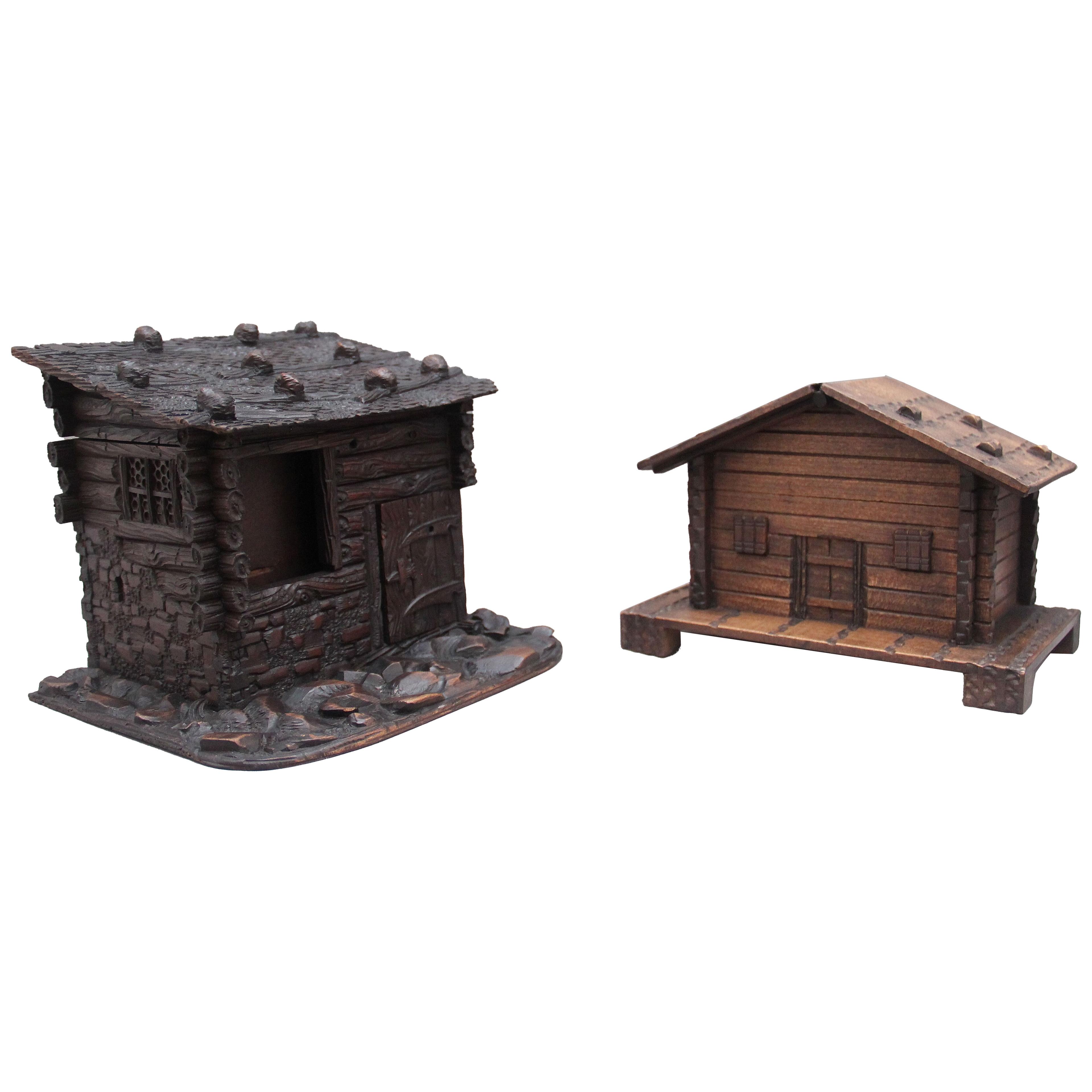 Two decorative 19th Century black forest cottages