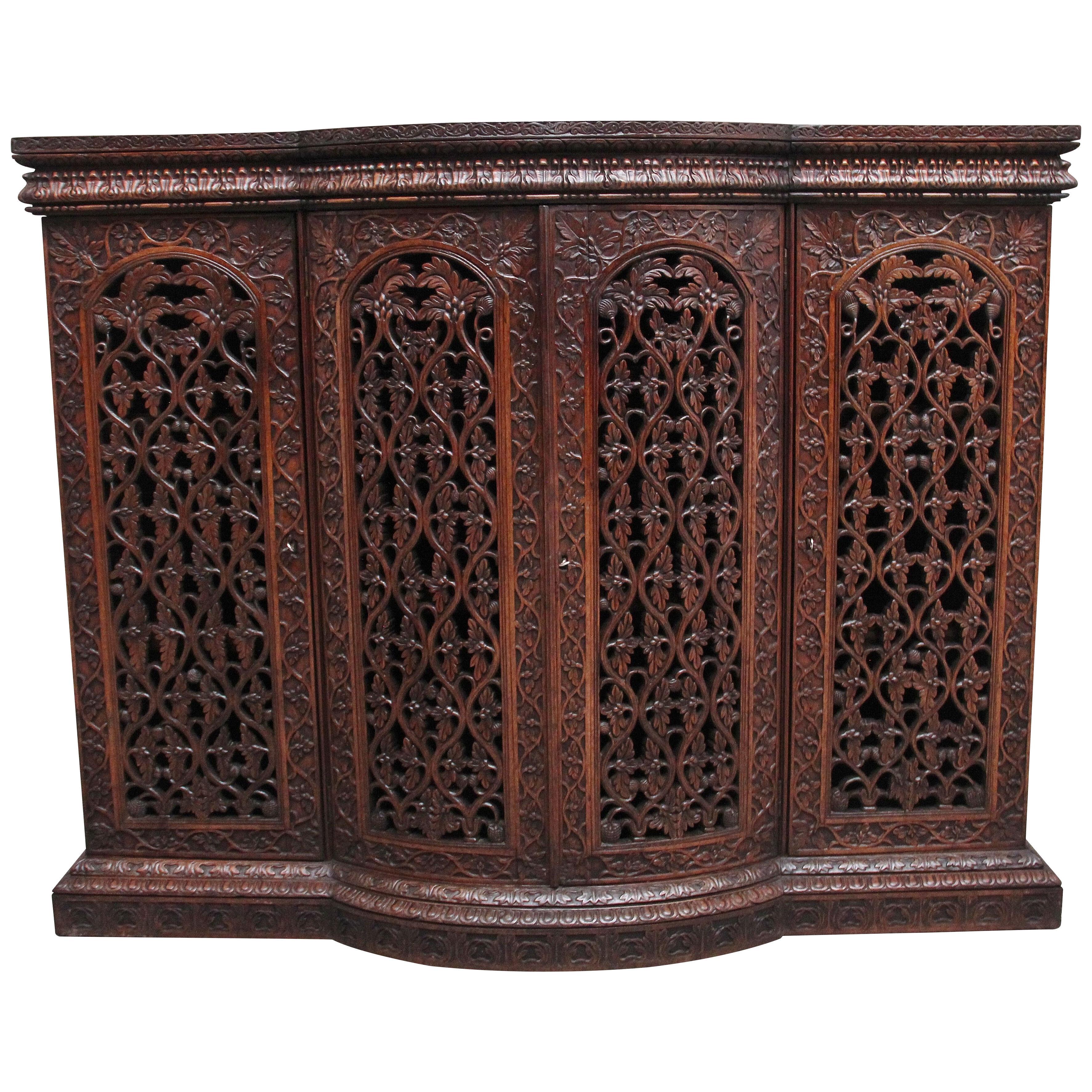 Mid 19th Century highly carved Anglo-Indian cabinet