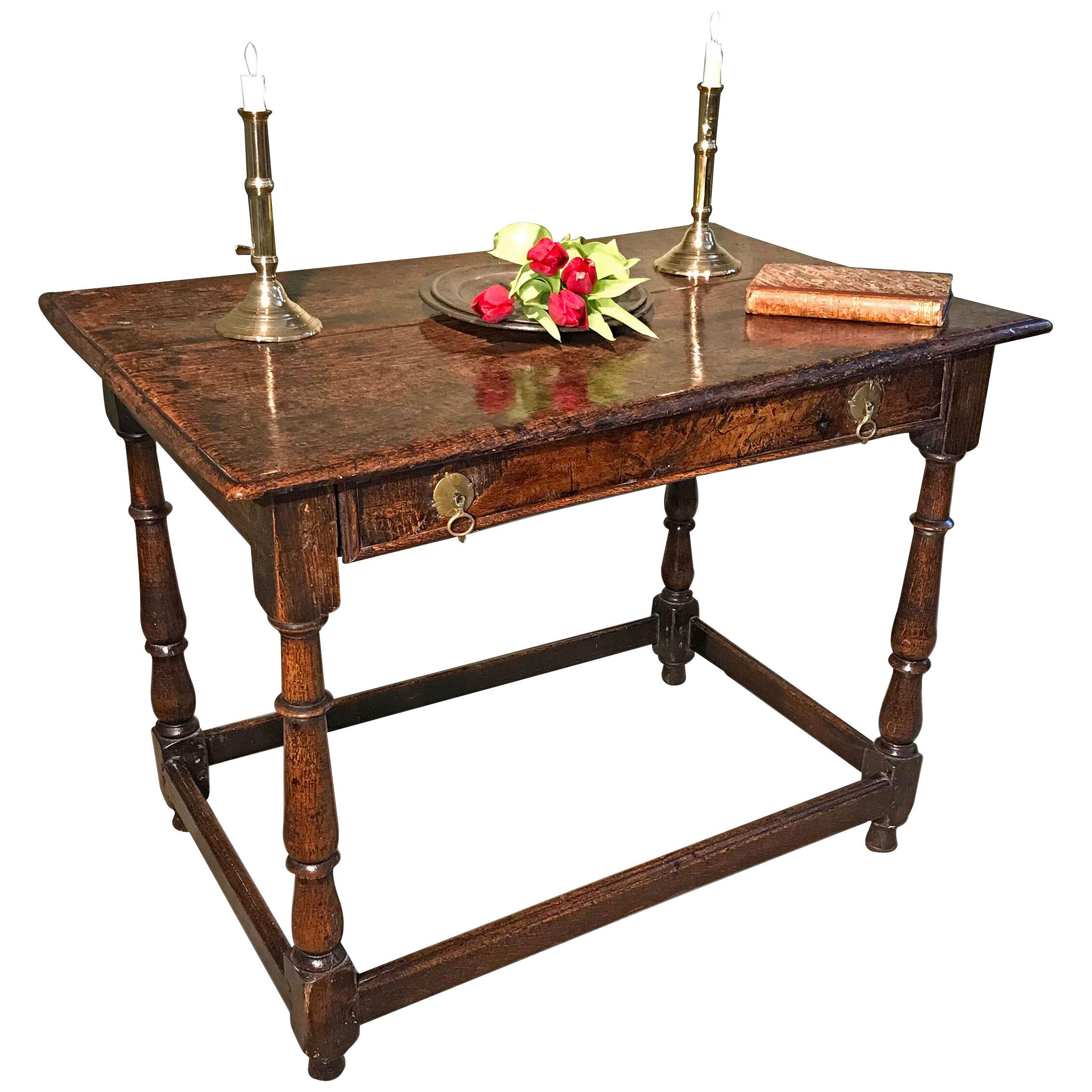 Late 17th century oak single drawer side table