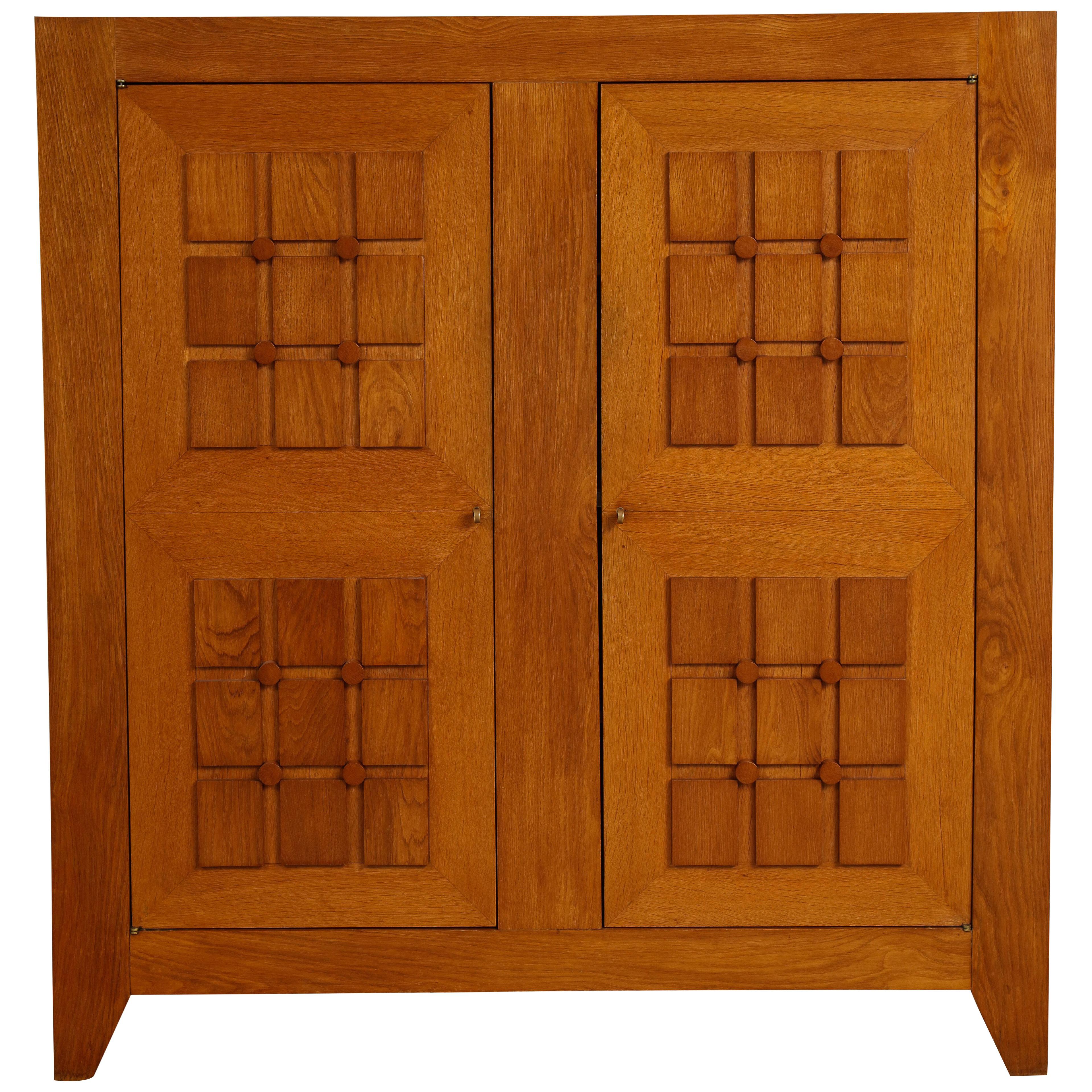 Large Sculpted Front Cabinet by Charles Dudouyt